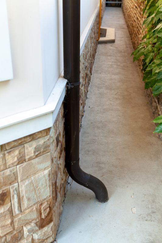 Steel Downspout Installation